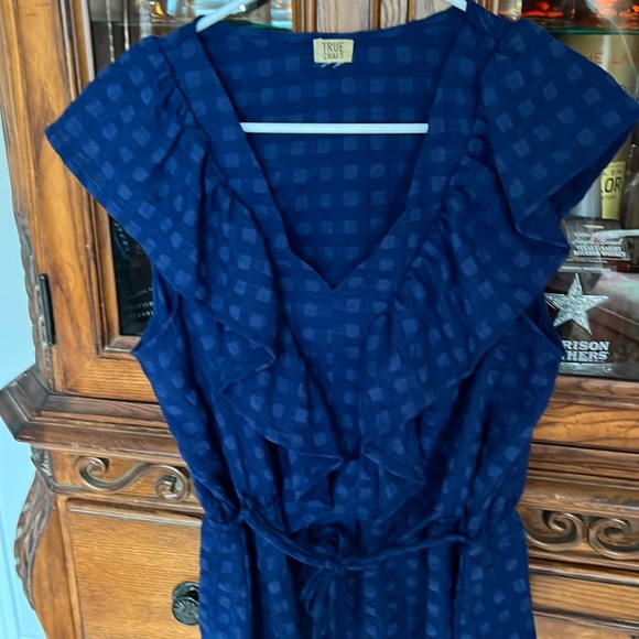 Navy ruffled tie top. - Picture 1 of 3